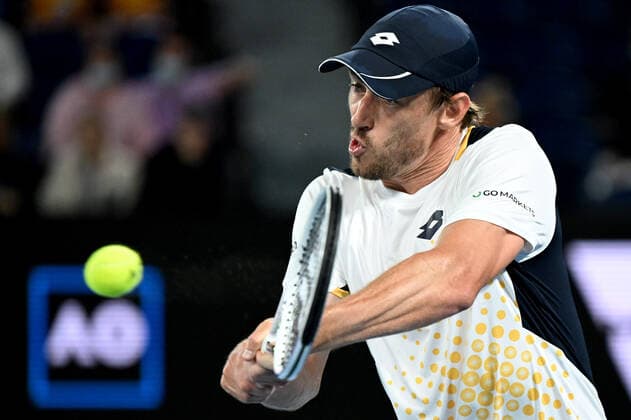 TENNIS AUSTRALIAN OPEN, John Millman of Australia plays a shot during his second round Men?s singles match against Alexander Zverev of Germany on Day 3 of the Australian Open, at Melbourne Park, in Melbourne, Wednesday, January 19, 2022. ( NO ARCHIVING, EDITORIAL USE ONLY, NO USE IN BOOKS WITHOUT CONSENT MELBOURNE VIC AUSTRALIA  Copyright: xDAVExHUNTx 20220119001614710451