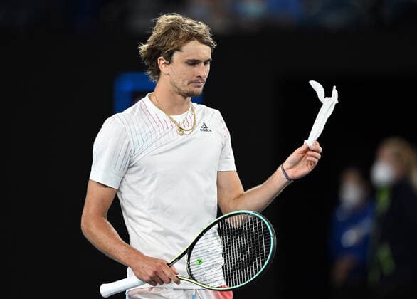 Mandatory Credit: Photo by James Gourley Shutterstock (12763717hc) Alexander Zverev removes his headband after victory in his second round match Australian Open, Day Three, Tennis, Melbourne Park, Melbourne, Australia - 19 Jan 2022 Australian Open, Day Three, Tennis, Melbourne Park, Melbourne, Australia - 19 Jan 2022 Copyright: xJamesxGourley Shutterstockx 12763717hc