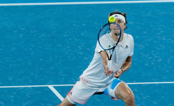 (220119) -- MELBOURNE, Jan. 19, 2022 -- Alexander Zverev of Germany competes during the Men s Singles second round match against John Millman of Australia at Australian Open in Melbourne Park, in Melbourne, Australia, on Jan. 19, 2022. (Photo by Hu Jingchen Xinhua) (SP)AUSTRALIA-MELBOURNE-TENNIS-AUSTRALIAN OPEN-MEN S SINGLES BaixXuefei 