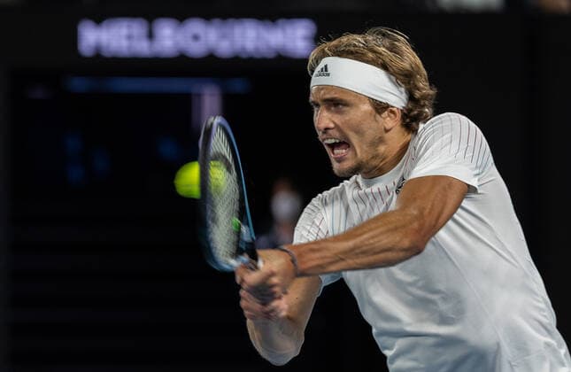 (220119) -- MELBOURNE, Jan. 19, 2022 -- Alexander Zverev of Germany competes during the Men s Singles second round match against John Millman of Australia at Australian Open in Melbourne Park, in Melbourne, Australia, on Jan. 19, 2022. (Photo by Hu Jingchen Xinhua) (SP)AUSTRALIA-MELBOURNE-TENNIS-AUSTRALIAN OPEN-MEN S SINGLES BaixXuefei 