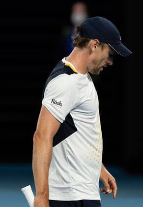(220119) -- MELBOURNE, Jan. 19, 2022 -- John Millman of Australia reacts during the Men s Singles second round match against Alexander Zverev of Germany at Australian Open in Melbourne Park, in Melbourne, Australia, on Jan. 19, 2022. (Photo by Hu Jingchen Xinhua) (SP)AUSTRALIA-MELBOURNE-TENNIS-AUSTRALIAN OPEN-MEN S SINGLES BaixXuefei 
