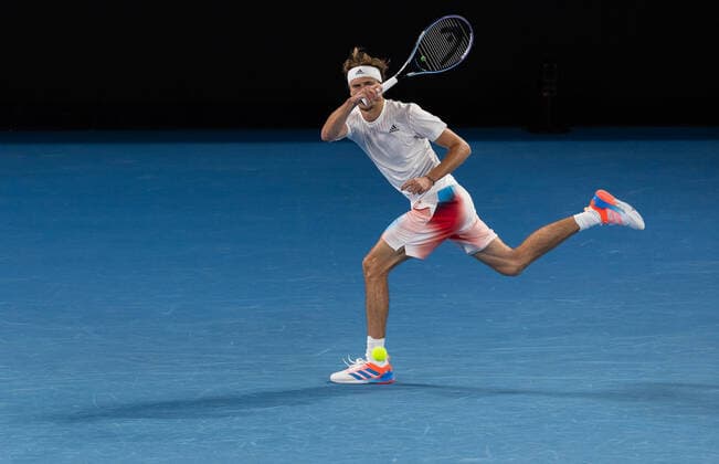 (220119) -- MELBOURNE, Jan. 19, 2022 -- Alexander Zverev of Germany competes during the Men s Singles second round match against John Millman of Australia at Australian Open in Melbourne Park, in Melbourne, Australia, on Jan. 19, 2022. (Photo by Hu Jingchen Xinhua) (SP)AUSTRALIA-MELBOURNE-TENNIS-AUSTRALIAN OPEN-MEN S SINGLES BaixXuefei 