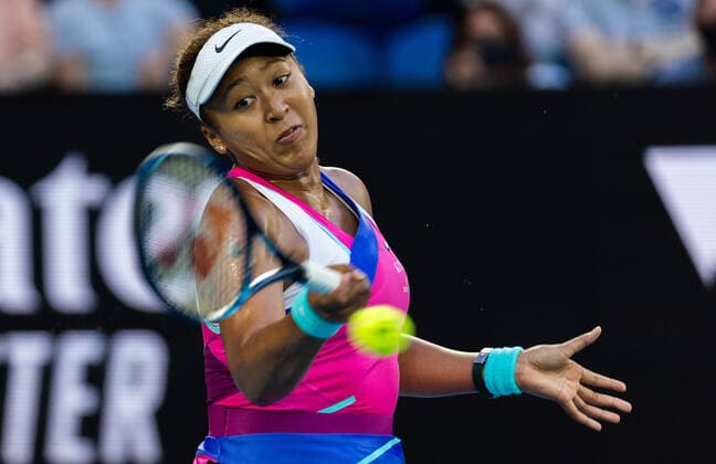 (220119) -- MELBOURNE, Jan. 19, 2022 -- Osaka Naomi of Japan returns a shot during the Women s single match against Madison Brengle of the United States at Australian Open in Melbourne Park, in Melbourne, Australia, Jan. 19, 2022. (Photo by Xinhua) (SP)AUSTRALIA-MELBOURNE-TENNIS-AUSTRALIAN OPEN-WOMEN S SINGLES HuxJingchen 