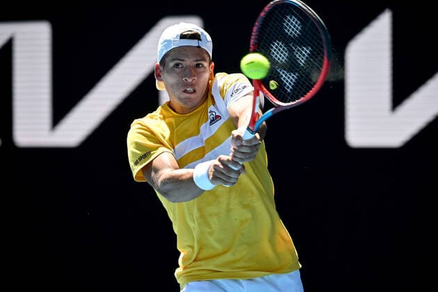 TENNIS AUSTRALIAN OPEN, Sebastian Baez of Argentina plays a shot during his second round Men?s singles match against Stefanos Tsitsipas of Greece on day 4 of the Australian Open at Melbourne Park in Melbourne, Thursday, January 20, 2022. ( NO ARCHIVING, EDITORIAL USE ONLY, NO USE IN BOOKS WITHOUT CONSENT MELBOURNE VICTORIA AUSTRALIA  Copyright: xJOELxCARRETTx 20220120001615101854