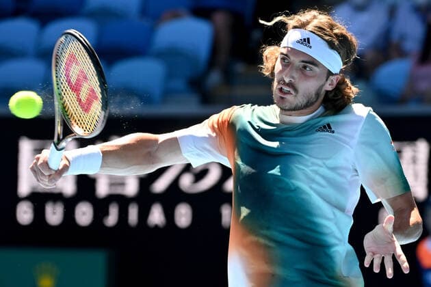 TENNIS AUSTRALIAN OPEN, Stefanos Tsitsipas of Greece plays a shot during his second round Men?s singles match against Sebastian Baez of Argentinaon day 4 of the Australian Open at Melbourne Park in Melbourne, Thursday, January 20, 2022. ( NO ARCHIVING, EDITORIAL USE ONLY, NO USE IN BOOKS WITHOUT CONSENT MELBOURNE VICTORIA AUSTRALIA  Copyright: xJOELxCARRETTx 20220120001615102102
