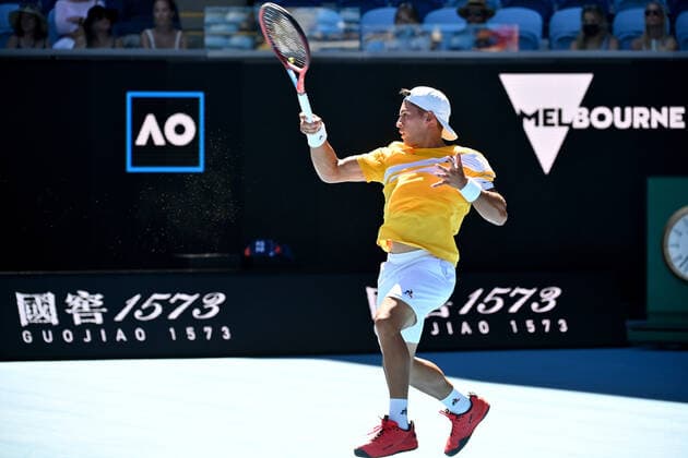 TENNIS AUSTRALIAN OPEN, Sebastian Baez of Argentina plays a shot during his second round Men?s singles match against Stefanos Tsitsipas of Greece on day 4 of the Australian Open at Melbourne Park in Melbourne, Thursday, January 20, 2022. ( NO ARCHIVING, EDITORIAL USE ONLY, NO USE IN BOOKS WITHOUT CONSENT MELBOURNE VICTORIA AUSTRALIA  Copyright: xJOELxCARRETTx 20220120001615102230