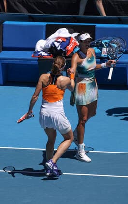(220120) -- MELBOURNE, Jan. 20, 2022 -- Garbine Muguruza (R) of Spain greets Alize Cornet of France after their Women s Single second round match at Australian Open in Melbourne Park, in Melbourne, Australia, on Jan. 20, 2022. ) (SP)AUSTRALIA-MELBOURNE-TENNIS-AUSTRALIAN OPEN-WOMEN S SINGLES-SECOND ROUND BaixXuefei 