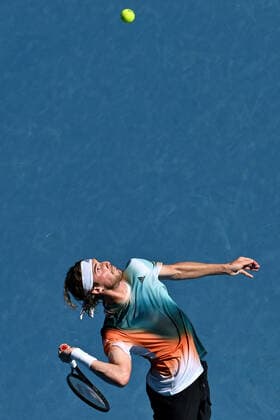 TENNIS AUSTRALIAN OPEN, Stefanos Tsitsipas of Greece serves during his second round Men?s singles match against Sebastian Baez of Argentinaon day 4 of the Australian Open at Melbourne Park in Melbourne, Thursday, January 20, 2022. ( NO ARCHIVING, EDITORIAL USE ONLY, NO USE IN BOOKS WITHOUT CONSENT MELBOURNE VICTORIA AUSTRALIA  Copyright: xJOELxCARRETTx 20220120001615103527