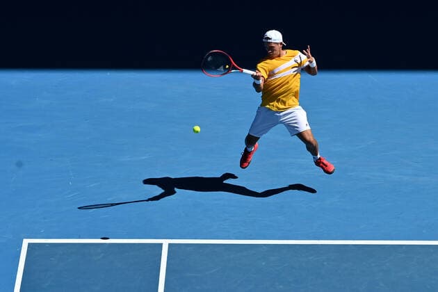 TENNIS AUSTRALIAN OPEN, Sebastian Baez of Argentina plays a shot during his second round Men?s singles match against Stefanos Tsitsipas of Greece on day 4 of the Australian Open at Melbourne Park in Melbourne, Thursday, January 20, 2022. ( NO ARCHIVING, EDITORIAL USE ONLY, NO USE IN BOOKS WITHOUT CONSENT MELBOURNE VICTORIA AUSTRALIA  Copyright: xJOELxCARRETTx 20220120001615103650