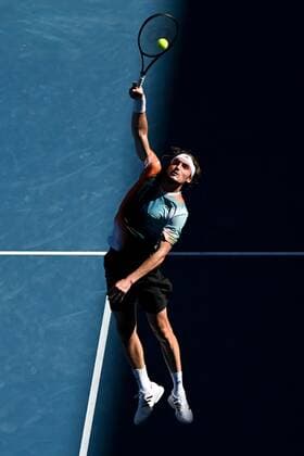 Mandatory Credit: Photo by James Gourley Shutterstock (12765058eu) Stefanos Tsitsipas during his second round match Australian Open, Day Four, Tennis, Melbourne Park, Melbourne, Australia - 20 Jan 2022 Australian Open, Day Four, Tennis, Melbourne Park, Melbourne, Australia - 20 Jan 2022 Copyright: xJamesxGourley Shutterstockx 12765058eu