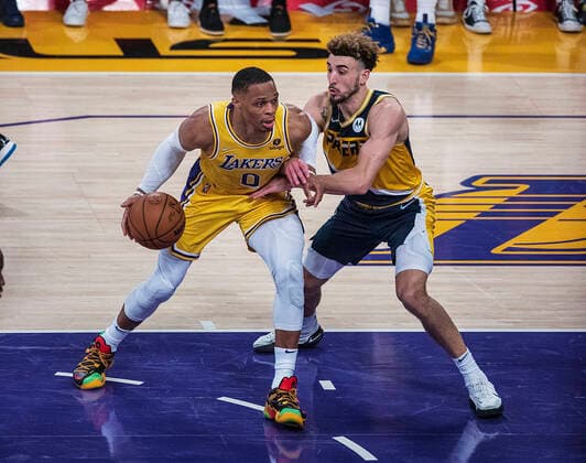 January 19, 2022, Los Angeles, California, USA: Russell Westbrook 0 of the Los Angeles Lakers is defended by Chris Duarte 3 of the Indiana Pacers during their NBA, Basketball Herren, USA game on Wednesday January 19, 2022 at Crypto.com Arena in Los Angeles, California. PI Los Angeles USA - ZUMAp124 20220119_zaa_p124_028 Copyright: xJAVIERxROJASx