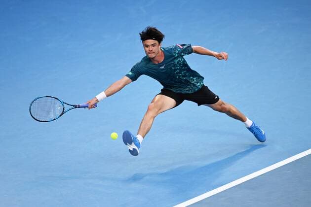 Mandatory Credit: Photo by James Gourley Shutterstock (12765058ij) Taro Daniel during his second round match Australian Open, Day Four, Tennis, Melbourne Park, Melbourne, Australia - 20 Jan 2022 Australian Open, Day Four, Tennis, Melbourne Park, Melbourne, Australia - 20 Jan 2022 Copyright: xJamesxGourley Shutterstockx 12765058ij
