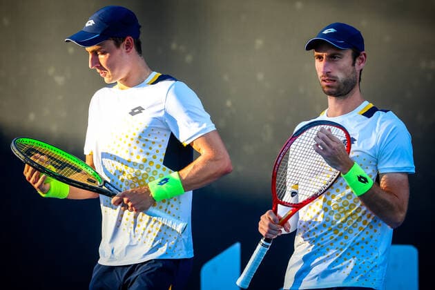 Belgian Joran Vliegen and Belgian Sander Gille pictured during a tennis match between the Belgian pair Gille-Vliegen and the French pair Bonzi-Rinderknech, in the first round of the men s doubles at the Australian Open Grand Slam tennis tournament, Thursday 20 January 2022 in Melbourne Park, Melbourne, Australia. The 2022 edition of the Australian Grand Slam takes place from January 17th to January 30th. PATRICKxHAMILTON  x4066613x