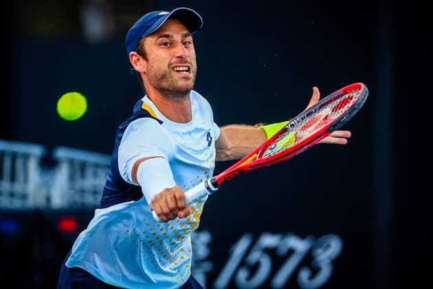 Belgian Sander Gille pictured in action during a tennis match between the Belgian pair Gille-Vliegen and the French pair Bonzi-Rinderknech, in the first round of the men s doubles at the Australian Open Grand Slam tennis tournament, Thursday 20 January 2022 in Melbourne Park, Melbourne, Australia. The 2022 edition of the Australian Grand Slam takes place from January 17th to January 30th. PATRICKxHAMILTON  x4067024x