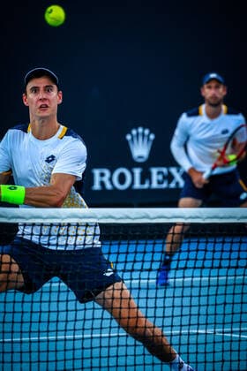Belgian Joran Vliegen and Belgian Sander Gille pictured in action during a tennis match between the Belgian pair Gille-Vliegen and the French pair Bonzi-Rinderknech, in the first round of the men s doubles at the Australian Open Grand Slam tennis tournament, Thursday 20 January 2022 in Melbourne Park, Melbourne, Australia. The 2022 edition of the Australian Grand Slam takes place from January 17th to January 30th. PATRICKxHAMILTON  x4067132x