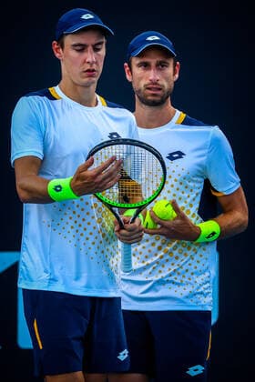 Belgian Joran Vliegen and Belgian Sander Gille pictured during a tennis match between the Belgian pair Gille-Vliegen and the French pair Bonzi-Rinderknech, in the first round of the men s doubles at the Australian Open Grand Slam tennis tournament, Thursday 20 January 2022 in Melbourne Park, Melbourne, Australia. The 2022 edition of the Australian Grand Slam takes place from January 17th to January 30th. PATRICKxHAMILTON  x4067151x