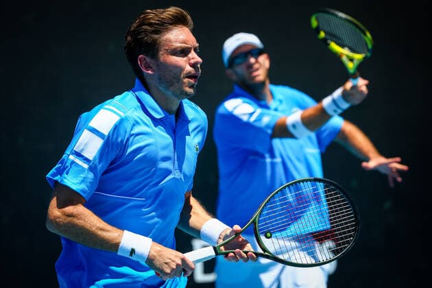 French Nicolas Mahut and French Fabrice Martin pictured during their men s doubles match, at the Australian Open Grand Slam tennis tournament, Thursday 20 January 2022 in Melbourne Park, Melbourne, Australia. The 2022 edition of the Australian Grand Slam takes place from January 17th to January 30th. PATRICKxHAMILTON  x4077022x