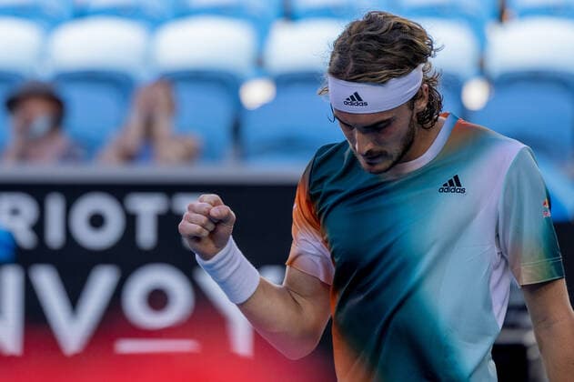 (220120) -- MELBOURNE, Jan. 20, 2022 -- Stefanos Tsitsipas of Greece celebrates during the men s singles 2nd round match against Sebastian Baez of Argentina at Australian Open in Melbourne Park, in Melbourne, Australia, Jan. 20, 2022. (Photo by Xinhua) (SP)AUSTRALIA-MELBOURNE-TENNIS-AUSTRALIAN OPEN-MEN S SINGLES HuxJingchen 