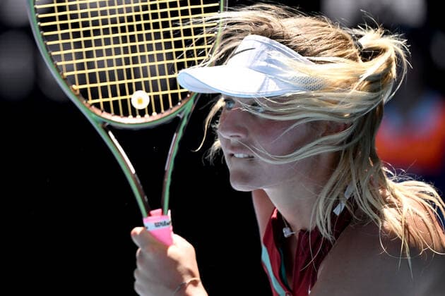TENNIS AUSTRALIAN OPEN, Marta Kostyuk of Ukraine plays a shot during her third round Women?s singles match against Paula Badosa of Spain on Day 5 of the Australian Open, at Melbourne Park, in Melbourne, Friday, January 21, 2022. ( NO ARCHIVING, EDITORIAL USE ONLY, NO USE IN BOOKS WITHOUT CONSENT MELBOURNE VIC AUSTRALIA  Copyright: xDEANxLEWINSx 20220121001615389819
