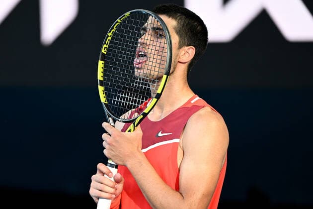 TENNIS AUSTRALIAN OPEN, Carlos Acaraz of Spain reacts during his third round Men?s singles match against Matteo Berrettini of Italy on Day 5 of the Australian Open, at Melbourne Park, in Melbourne, Friday, January 21, 2022. ( NO ARCHIVING, EDITORIAL USE ONLY, NO USE IN BOOKS WITHOUT CONSENT MELBOURNE VIC AUSTRALIA  Copyright: xDAVExHUNTx 20220121001615412206