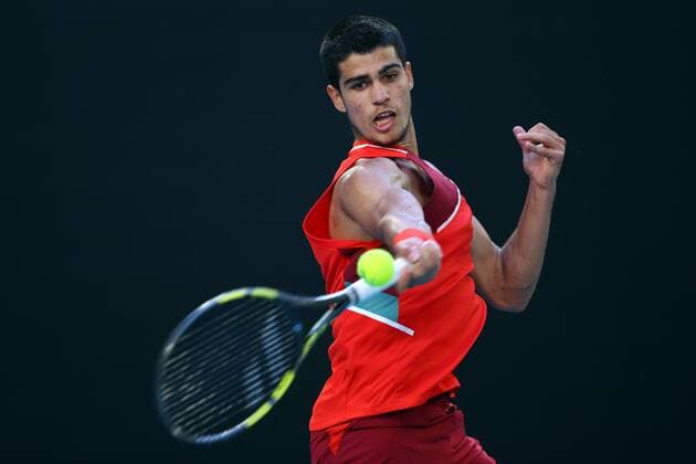 Mandatory Credit: Photo by Ella Ling Shutterstock (12765070cm) Carlos Alcaraz Garfia during his third round match Australian Open, Day Five, Tennis, Melbourne Park, Melbourne, Australia - 21 Jan 2022 Australian Open, Day Five, Tennis, Melbourne Park, Melbourne, Australia - 21 Jan 2022 Copyright: xEllaxLing Shutterstockx 12765070cm