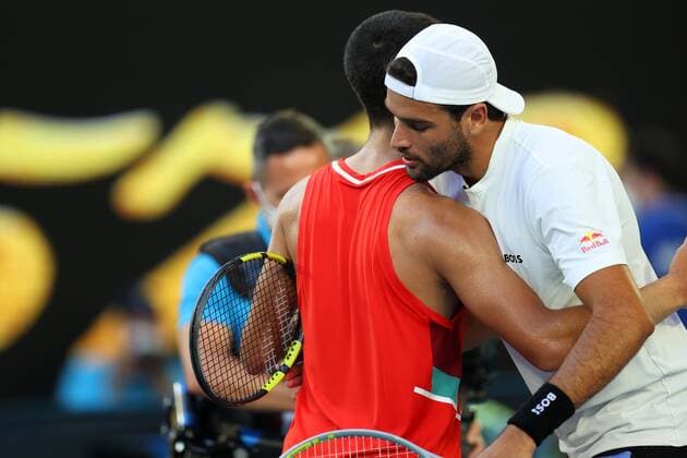 Mandatory Credit: Photo by Ella Ling Shutterstock (12765070ck) Matteo Berrettini and Carlos Alcaraz Garfia after their third round match Australian Open, Day Five, Tennis, Melbourne Park, Melbourne, Australia - 21 Jan 2022 Australian Open, Day Five, Tennis, Melbourne Park, Melbourne, Australia - 21 Jan 2022 Copyright: xEllaxLing Shutterstockx 12765070ck