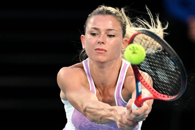 TENNIS AUSTRALIAN OPEN, Camila Giorgi of Italy during her third round Women?s singles match against Ashleigh Barty of Australia on Day 5 of the Australian Open, at Melbourne Park, in Melbourne, Friday, January 21, 2022. ( NO ARCHIVING, EDITORIAL USE ONLY, NO USE IN BOOKS WITHOUT CONSENT MELBOURNE VIC AUSTRALIA  Copyright: xDAVExHUNTx 20220121001615434054