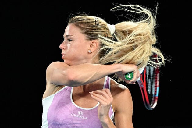 TENNIS AUSTRALIAN OPEN, Camila Giorgi of Italy during her third round Women?s singles match against Ashleigh Barty of Australia on Day 5 of the Australian Open, at Melbourne Park, in Melbourne, Friday, January 21, 2022. ( NO ARCHIVING, EDITORIAL USE ONLY, NO USE IN BOOKS WITHOUT CONSENT MELBOURNE VIC AUSTRALIA  Copyright: xDAVExHUNTx 20220121001615438149