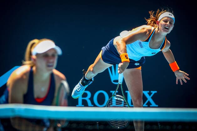 Belgian Greet Minnen and Australian Ellen Perez pictured in action during a tennis match between the Belgian-Australian pair Minnen - Perez and the Chinese-US pair Guarachi - Melichar-Martinez, in the second round of the women s doubles at the Australian Open Grand Slam tennis tournament, Friday 21 January 2022 in Melbourne Park, Melbourne, Australia. The 2022 edition of the Australian Grand Slam takes place from January 17th to January 30th. PATRICKxHAMILTON  x4403379x
