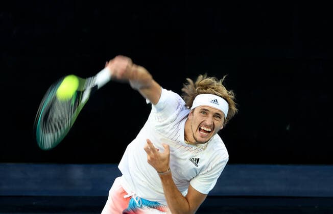 (220121) -- MELBOURNE, Jan. 21, 2022 -- Alexander Zverev of Germany competes during the men s singles 3rd round match against Radu Albot of Moldova during Australian Open in Melbourne, Australia, Jan. 21, 2022. ) (SP)AUSTRALIA-MELBOURNE-TENNIS-AUSTRALIAN OPEN-MEN S SINGLES-THIRD ROUND BaixXuefei 