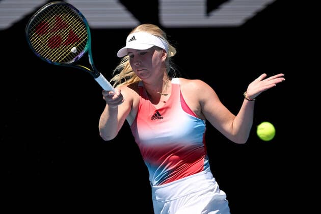TENNIS AUSTRALIAN OPEN, Clara Tauson of Denmark plays a shot during her third round match against Danielle Collins of the USA on Day 6 of the Australian Open, at Melbourne Park, in Melbourne, Saturday, January 22, 2022. ( NO ARCHIVING, EDITORIAL USE ONLY, NO USE IN BOOKS WITHOUT CONSENT MELBOURNE VIC AUSTRALIA  Copyright: xDEANxLEWINSx 20220122001615681405