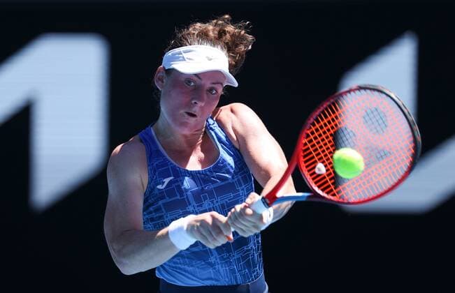 Mandatory Credit: Photo by Ella Ling Shutterstock (12765089l) Tamara Zidansek in third round action Australian Open, Day Six, Tennis, Melbourne Park, Melbourne, Australia - 22 Jan 2022 Australian Open, Day Six, Tennis, Melbourne Park, Melbourne, Australia - 22 Jan 2022 Copyright: xEllaxLing Shutterstockx 12765089l