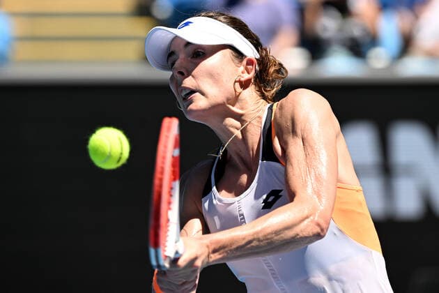 TENNIS AUSTRALIAN OPEN, Alize Cornet of France plays a shot during her third round match against Tamara Zidansek of Slovenia on Day 6 of the Australian Open, at Melbourne Park, in Melbourne, Saturday, January 22, 2022. ( NO ARCHIVING, EDITORIAL USE ONLY, NO USE IN BOOKS WITHOUT CONSENT MELBOURNE VIC AUSTRALIA  Copyright: xDEANxLEWINSx 20220122001615687577