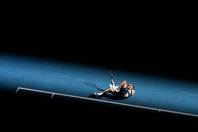 TENNIS AUSTRALIAN OPEN, Stefanos Tsitsipas of Greece falls during his third round match against Benoit Paire of France on Day 6 of the Australian Open, at Melbourne Park, in Melbourne, Saturday, January 22, 2022. ( NO ARCHIVING, EDITORIAL USE ONLY, NO USE IN BOOKS WITHOUT CONSENT MELBOURNE VIC AUSTRALIA  Copyright: xDEANxLEWINSx 20220122001615799312
