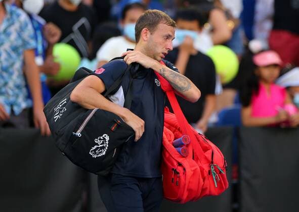 Mandatory Credit: Photo by Ella Ling Shutterstock (12765089db) Dan Evans walks off court after defeat in his third round match Australian Open, Day Six, Tennis, Melbourne Park, Melbourne, Australia - 22 Jan 2022 Australian Open, Day Six, Tennis, Melbourne Park, Melbourne, Australia - 22 Jan 2022 Copyright: xEllaxLing Shutterstockx 12765089db