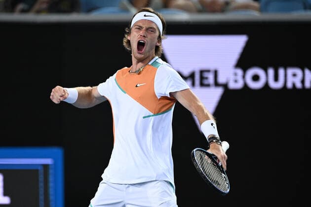 TENNIS AUSTRALIAN OPEN, Andrey Rublev of Russia celebrates during his third round match against Marin Cilic of Croatia on Day 6 of the Australian Open, at Melbourne Park, in Melbourne, Saturday, January 22, 2022. ( NO ARCHIVING, EDITORIAL USE ONLY, NO USE IN BOOKS WITHOUT CONSENT MELBOURNE VIC AUSTRALIA  Copyright: xDEANxLEWINSx 20220122001615835844