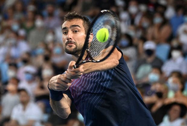 TENNIS AUSTRALIAN OPEN, Marin Cilic of Croatia plays a shot during his third round match against Andrey Rublev of Russia on Day 6 of the Australian Open, at Melbourne Park, in Melbourne, Saturday, January 22, 2022. ( NO ARCHIVING, EDITORIAL USE ONLY, NO USE IN BOOKS WITHOUT CONSENT MELBOURNE VIC AUSTRALIA  Copyright: xDEANxLEWINSx 20220122001615837954