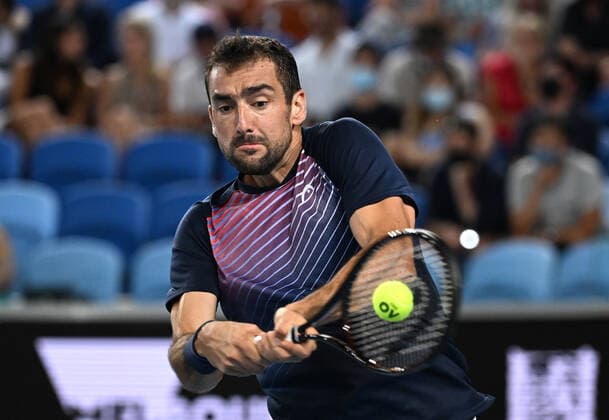 TENNIS AUSTRALIAN OPEN, Marin Cilic of Croatia plays a shot during his third round match against Andrey Rublev of Russia on Day 6 of the Australian Open, at Melbourne Park, in Melbourne, Saturday, January 22, 2022. ( NO ARCHIVING, EDITORIAL USE ONLY, NO USE IN BOOKS WITHOUT CONSENT MELBOURNE VIC AUSTRALIA  Copyright: xDEANxLEWINSx 20220122001615837978