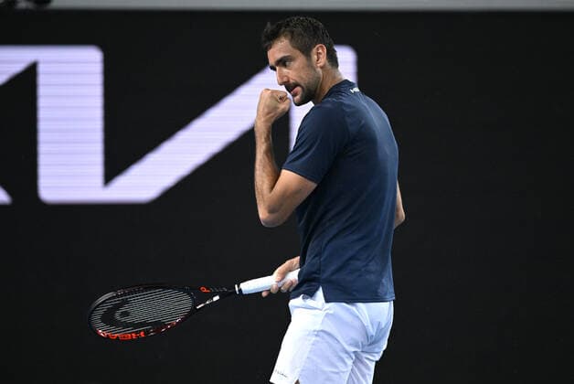 TENNIS AUSTRALIAN OPEN, Marin Cilic of Croatia reacts during his third round match against Andrey Rublev of Russia on Day 6 of the Australian Open, at Melbourne Park, in Melbourne, Saturday, January 22, 2022. ( NO ARCHIVING, EDITORIAL USE ONLY, NO USE IN BOOKS WITHOUT CONSENT MELBOURNE VIC AUSTRALIA  Copyright: xDEANxLEWINSx 20220122001615842933