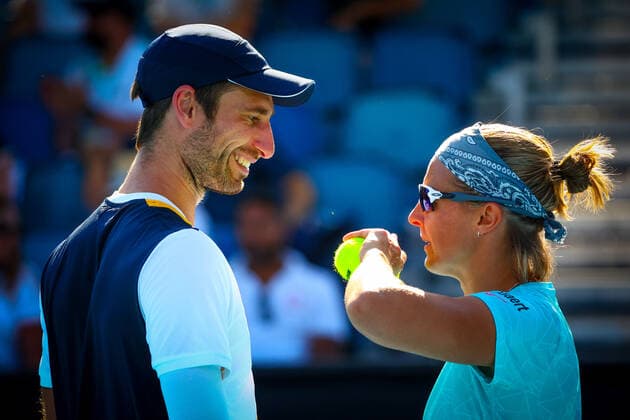 Belgian Kirsten Flipkens and Belgian Sander Gille pictured in action during a tennis match between the Belgian pair Flipkens-Gille and French-Croatian pair Mladenovic-Dodig, in the first round of the mixed doubles at the Australian Open Grand Slam tennis tournament, Saturday 22 January 2022 in Melbourne Park, Melbourne, Australia. The 2022 edition of the Australian Grand Slam takes place from January 17th to January 30th. PATRICKxHAMILTON  x4799865x