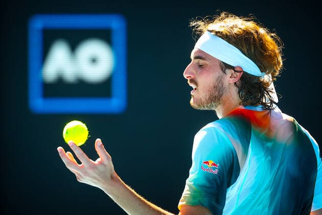 Greek Stefanos Tsitsipas pictured in action during a tennis match between french Paire and greek Tsitsipas, in the third round of the men s singles at the Australian Open Grand Slam tennis tournament, Saturday 22 January 2022 in Melbourne Park, Melbourne, Australia. The 2022 edition of the Australian Grand Slam takes place from January 17th to January 30th. PATRICKxHAMILTON  x4815670x