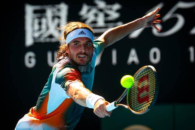Greek Stefanos Tsitsipas pictured in action during a tennis match between french Paire and greek Tsitsipas, in the third round of the men s singles at the Australian Open Grand Slam tennis tournament, Saturday 22 January 2022 in Melbourne Park, Melbourne, Australia. The 2022 edition of the Australian Grand Slam takes place from January 17th to January 30th. PATRICKxHAMILTON  x4815841x