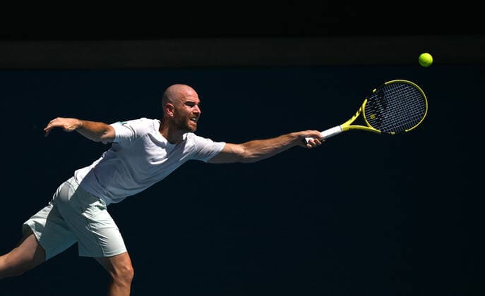 TENNIS AUSTRALIAN OPEN, Adrian Mannarino of France in action during the 4th round match against Rafael Nadal of Spain on Day 7 of the Australian Open at Melbourne Park in Melbourne, Sunday, January 23, 2022.( NO ARCHIVING, EDITORIAL USE ONLY, NO USE IN BOOKS WITHOUT CONSENT MELBOURNE VIC AUSTRALIA  Copyright: xDEANxLEWINSx 20220123001616111795