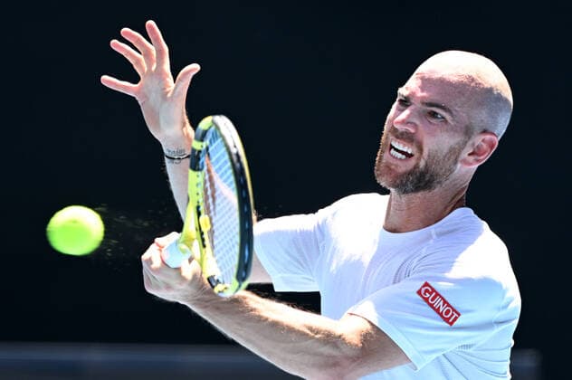TENNIS AUSTRALIAN OPEN, Adrian Mannarino of France in action during the 4th round match against Rafael Nadal of Spain on Day 7 of the Australian Open at Melbourne Park in Melbourne, Sunday, January 23, 2022. ( NO ARCHIVING, EDITORIAL USE ONLY, NO USE IN BOOKS WITHOUT CONSENT MELBOURNE VIC AUSTRALIA  Copyright: xDAVExHUNTx 20220123001616112420