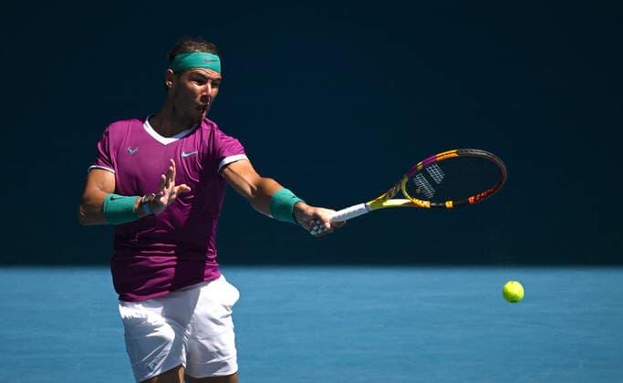 TENNIS AUSTRALIAN OPEN, Rafael Nadal of Spain in action during the 4th round match against Adrian Mannarino of France on Day 7 of the Australian Open at Melbourne Park in Melbourne, Sunday, January 23, 2022.( NO ARCHIVING, EDITORIAL USE ONLY, NO USE IN BOOKS WITHOUT CONSENT MELBOURNE VIC AUSTRALIA  Copyright: xDEANxLEWINSx 20220123001616113211