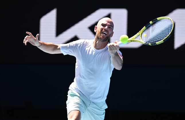 TENNIS AUSTRALIAN OPEN, Adrian Mannarino of France in action during the 4th round match against Rafael Nadal of Spain on Day 7 of the Australian Open at Melbourne Park in Melbourne, Sunday, January 23, 2022. ( NO ARCHIVING, EDITORIAL USE ONLY, NO USE IN BOOKS WITHOUT CONSENT MELBOURNE VIC AUSTRALIA  Copyright: xDAVExHUNTx 20220123001616115069