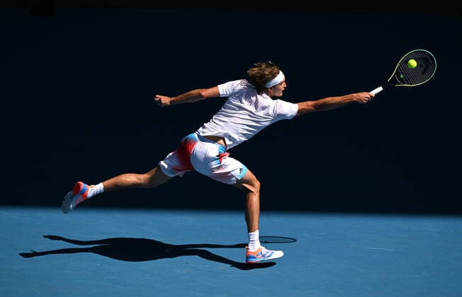 TENNIS AUSTRALIAN OPEN, Alexander Zverev of Germany in action during his 4th round match against Denis Shapovalov of Canada on Day 7 of the Australian Open at Melbourne Park in Melbourne, Sunday, January 23, 2022.( NO ARCHIVING, EDITORIAL USE ONLY, NO USE IN BOOKS WITHOUT CONSENT MELBOURNE VIC AUSTRALIA  Copyright: xDEANxLEWINSx 20220123001616123356