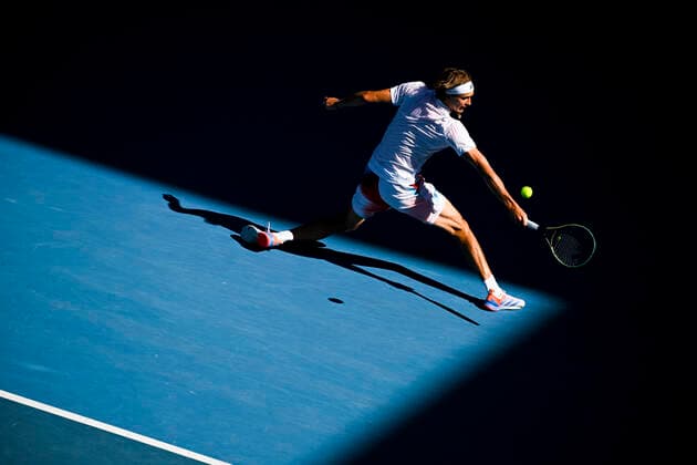 TENNIS AUSTRALIAN OPEN, Alexander Zverev of Germany plays a shot during his 4th round match against Denis Shapovalov of Canada on Day 7 of the Australian Open at Melbourne Park in Melbourne, Sunday, January 23, 2022. ( NO ARCHIVING, EDITORIAL USE ONLY, NO USE IN BOOKS WITHOUT CONSENT MELBOURNE VIC AUSTRALIA  Copyright: xDEANxLEWINSx 20220123001616132991