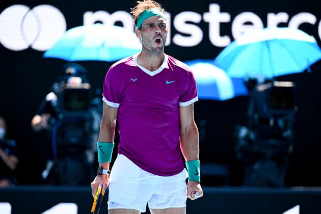 TENNIS AUSTRALIAN OPEN, Rafael Nadal of Spain reacts after winning the first set during the 4th round match against Adrian Mannarino of France on Day 7 of the Australian Open at Melbourne Park in Melbourne, Sunday, January 23, 2022. ( NO ARCHIVING, EDITORIAL USE ONLY, NO USE IN BOOKS WITHOUT CONSENT MELBOURNE VIC AUSTRALIA  Copyright: xDAVExHUNTx 20220123001616133758