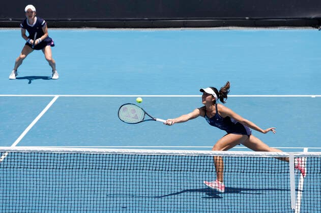 TENNIS AUSTRALIAN OPEN, Shuko Aoyama (left) and Ena Shibahara (right) of Japan are seen during their 3rd round double match against Vera Zvonareva of Russia and Viktoria Kuzmova of Slovakia on Day 8 of the Australian Open, at Melbourne Park, in Melbourne, Monday, January 24, 2022.( NO ARCHIVING, EDITORIAL USE ONLY, NO USE IN BOOKS WITHOUT CONSENT MELBOURNE VIC AUSTRALIA  Copyright: xDEANxLEWINSx 20220124001616468596